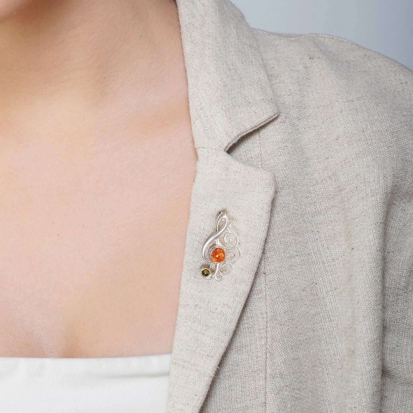 Cognac & Green Baltic Amber Treble Clef Brooch in Sterling Silver